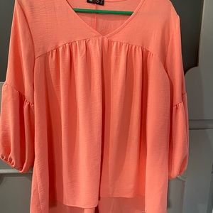 Coral/orange blouse